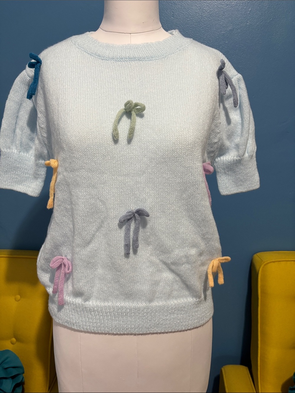 Light Blue Short-Sleeve Sweater with Pastel Bow Accents